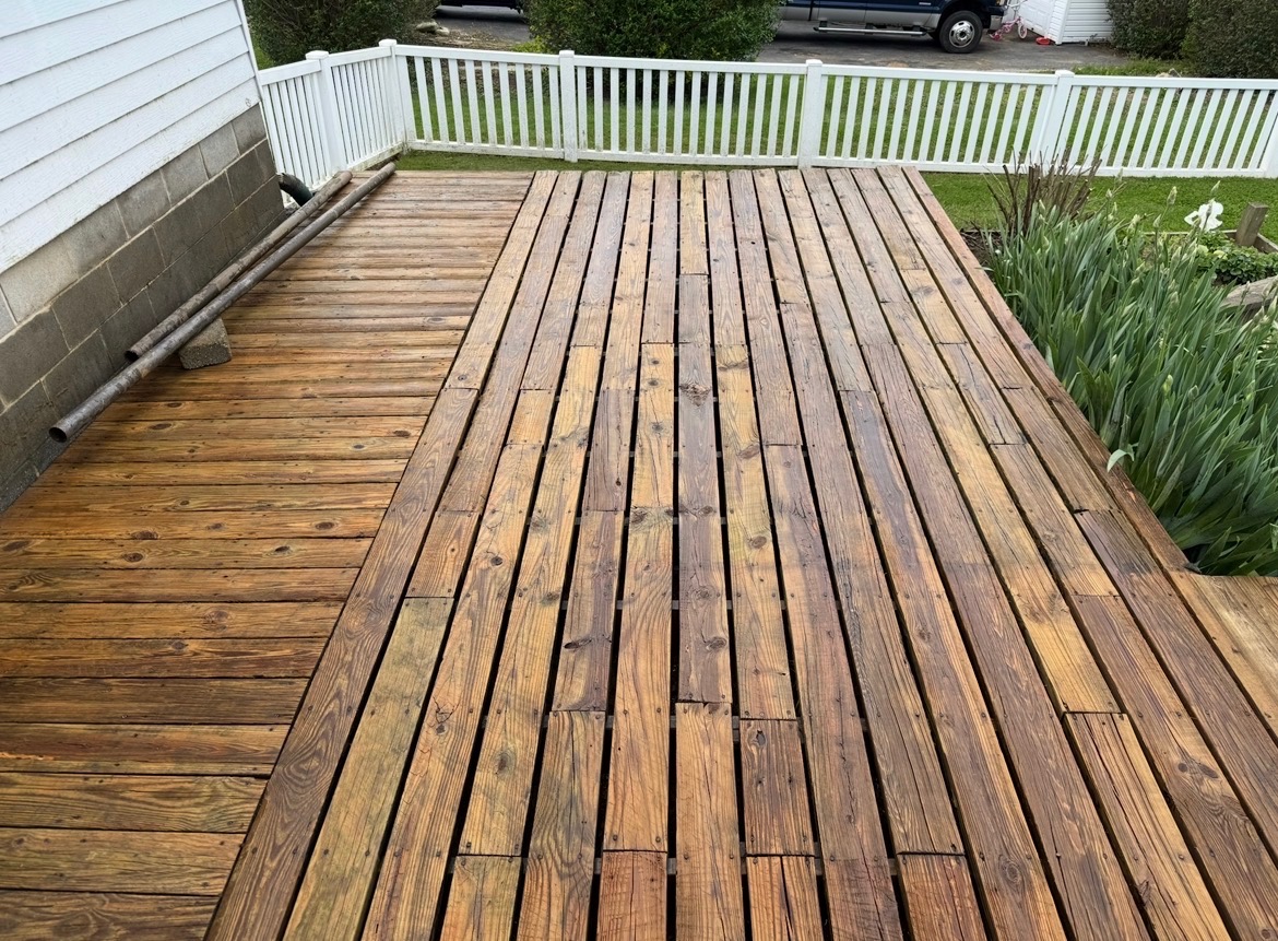 Full deck washed down and brought back to clean, even wood tone.